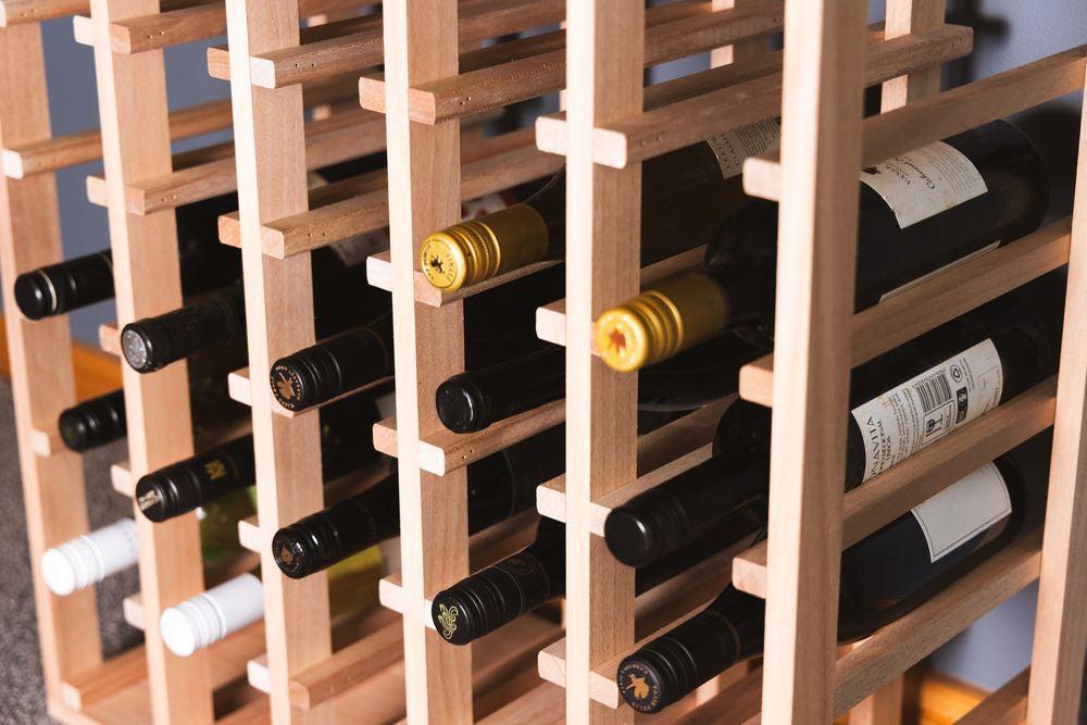 Stackable wine storage racks in matte black