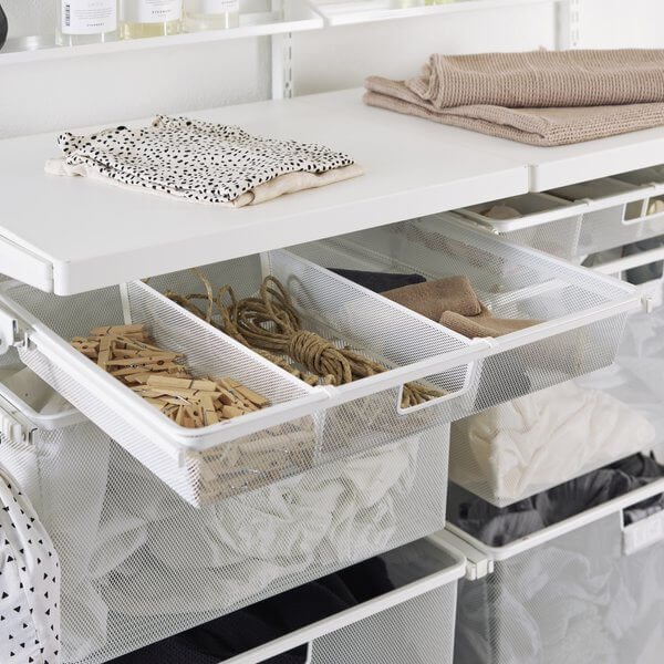 Elfa Mesh Drawer Dividers separating small items in a laundry drawer