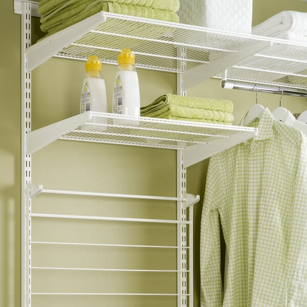 A collapsible Elfa Drying Shelf installed below Wire Shelving in a laundry room