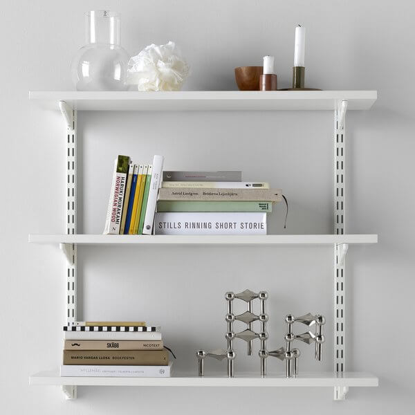 Elfa Plug In Melamine Shelf Kit set up as a 3-shelf wall-mounted bookshelf