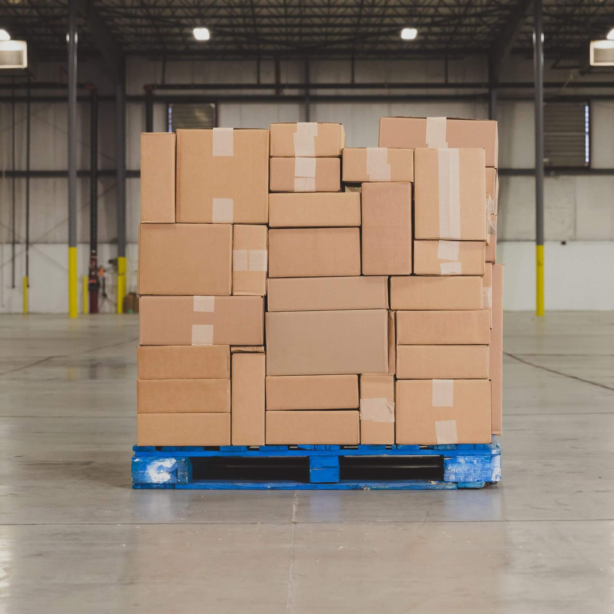 New products in cardboard boxes stored in a warehouse