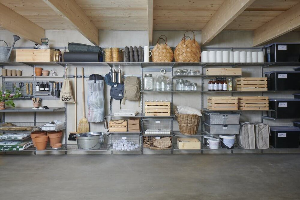 Platinum Elfa shelving and drawers for garage storage