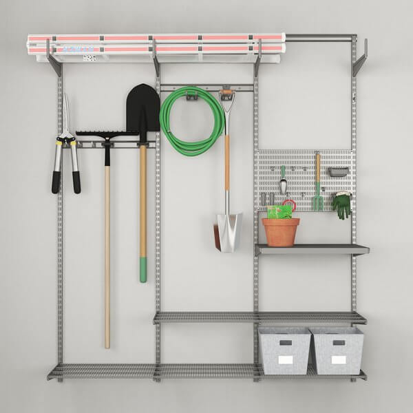 A Platinum Elfa garage storage system organising tools and gardening equipment