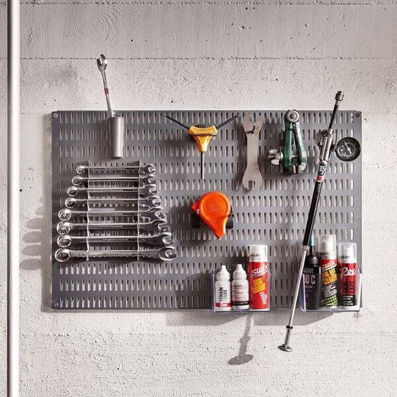 Spanners and cleaning equipment stored on a Platinum Elfa Storing Board