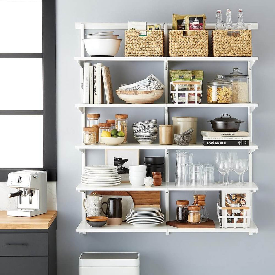 White Elfa kitchen storage with solid melamine shelves