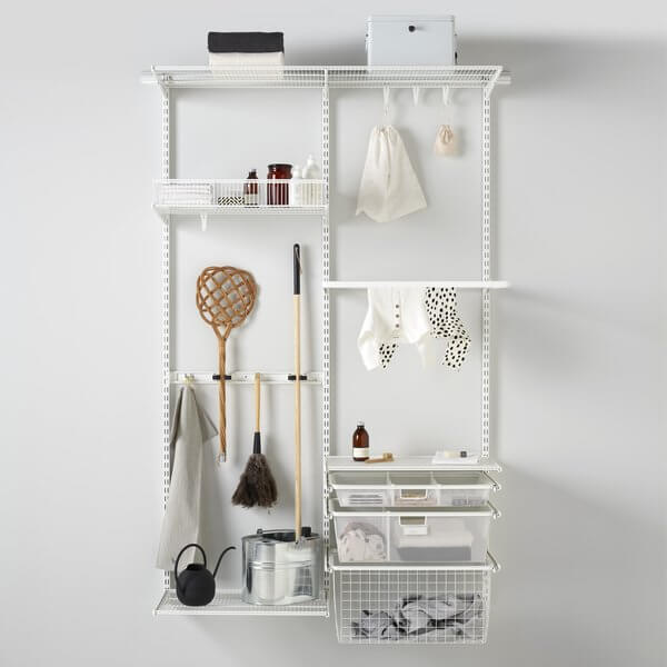 A white Elfa laundry storage system organising washing and drying clothes