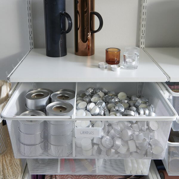 White Elfa Mesh Drawer Dividers separating and organising candles