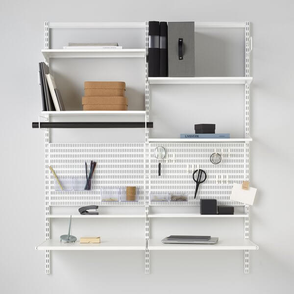 A White Elfa office storage system organising stationery, paperwork and office supplies