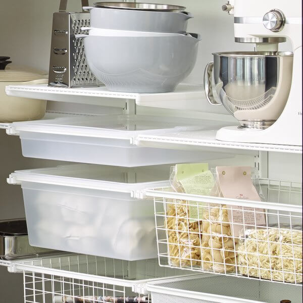 A white Elfa pantry storage system, with Wire and Solid Gliding Drawers and White Wire Shelves
