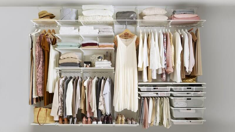 Elfa Wardrobe Storage in White with Click In Melamine Shelves, Gliding Mesh Drawers, a Valet Clothes Rod and Wire Shelves